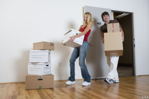 Dayton Home Inspection a couple packing moving into new home