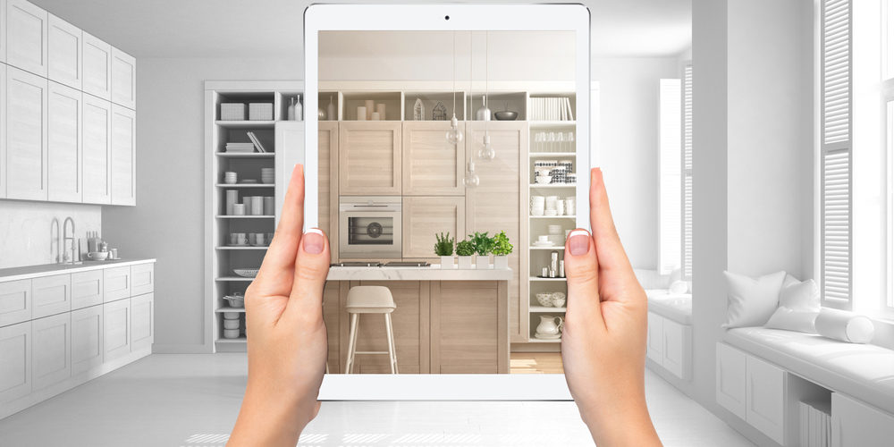 Hands,Holding,Tablet,Showing,Modern,White,And,Wooden,Kitchen,,Total
